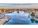 Scenic view of a tranquil lake, featuring charming gazebos and lush trees reflecting in the calm water at 4235 W Harrison St, Chandler, AZ 85226