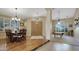 Elegant living space featuring formal dining, hardwood floors, and a billiards room at 4235 W Harrison St, Chandler, AZ 85226