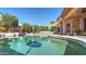Inviting backyard pool with ample patio space and lush landscaping for relaxing outdoor living and entertaining at 4235 W Harrison St, Chandler, AZ 85226