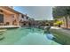 Backyard pool with built-in BBQ, covered patio, lush plants and privacy fence at 4235 W Harrison St, Chandler, AZ 85226