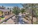 Scenic view of a community walkway lined with mature trees and lush landscaping at 4235 W Harrison St, Chandler, AZ 85226