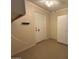 Laundry room with a coat rack, utility door and storage at 4615 E Emerald Ave, Mesa, AZ 85206