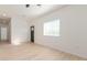 Spacious living room with a window, showcasing a comfortable and airy space at 463 W Taylor Ave, Coolidge, AZ 85128