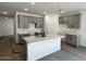 Well-designed kitchen featuring gray cabinetry, a central island, and ample counter space at 5628 W Summerside Rd, Laveen, AZ 85339