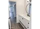 Bathroom featuring white vanity with quartz countertop and updated fixtures at 5987 N 48Th Dr, Glendale, AZ 85301