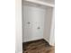 Laundry room with modern vinyl flooring and white walls at 5987 N 48Th Dr, Glendale, AZ 85301