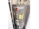 Energy efficient Rheem water heater in the utility closet at 5987 N 48Th Dr, Glendale, AZ 85301