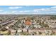 Aerial view of the house nestled in a well-developed residential area with beautiful neighborhood at 7038 W Beverly Rd, Laveen, AZ 85339