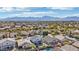Expansive desert community featuring single Gathering homes with lush yards and mountain views at 7038 W Beverly Rd, Laveen, AZ 85339