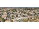 Vibrant neighborhood showcasing lush landscaping and various home styles at 7038 W Beverly Rd, Laveen, AZ 85339