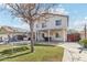 Expansive backyard featuring patio, pool, yard and shade trees at 7038 W Beverly Rd, Laveen, AZ 85339