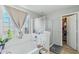 Bathroom features a soaking tub and separate glass-enclosed shower at 7038 W Beverly Rd, Laveen, AZ 85339
