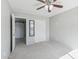 Comfortable bedroom showcasing neutral walls, carpet, closet, and access to ensuite at 7038 W Beverly Rd, Laveen, AZ 85339