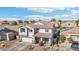 Gorgeous two-story home featuring a two-car garage, well-kept landscaping and a cute bench at 7038 W Beverly Rd, Laveen, AZ 85339