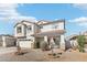 Exterior elevation of home with well-maintained front yard, drought-resistant landscaping at 7038 W Beverly Rd, Laveen, AZ 85339