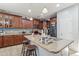 Island kitchen featuring granite countertops, stainless steel appliances, and plenty of storage at 7038 W Beverly Rd, Laveen, AZ 85339