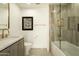 Elegant bathroom with tile flooring, marble countertops, sleek fixtures and framed art at 7175 E Camelback Rd # 401, Scottsdale, AZ 85251