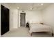 Minimalist bedroom featuring a modern bed, soft tones, and sleek design at 7175 E Camelback Rd # 401, Scottsdale, AZ 85251