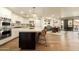 Bright and airy kitchen flows into the dining area with bar and outdoor patio access at 7175 E Camelback Rd # 401, Scottsdale, AZ 85251