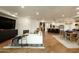 Open-concept living space featuring a living room, dining area, and kitchen with seamless flow at 7175 E Camelback Rd # 401, Scottsdale, AZ 85251