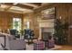 Inviting lobby with wood paneling, fireplace, comfortable seating, and elegant decor at 7175 E Camelback Rd # 401, Scottsdale, AZ 85251