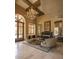 Stately lobby with a grand chandelier, marble floors, a cozy seating area, and elegant decor at 7175 E Camelback Rd # 401, Scottsdale, AZ 85251