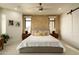 Stylish main bedroom showcases a luxurious bed, bedside tables, and a sophisticated modern design at 7175 E Camelback Rd # 401, Scottsdale, AZ 85251