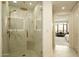 Luxurious shower features a rain shower head, marble tile, and glass enclosure at 7175 E Camelback Rd # 401, Scottsdale, AZ 85251