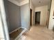 An unfinished bathroom featuring plywood floors, space for shower and drywall installed at 9613 W Parkway Dr, Tolleson, AZ 85353