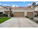 Spacious two-car garage with a long driveway and well-maintained landscaping at 9705 E Mountain View Rd # 1143, Scottsdale, AZ 85258