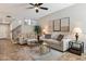 Inviting living room with tile flooring, ceiling fan, and neutral tones offers a comfortable gathering space at 9705 E Mountain View Rd # 1143, Scottsdale, AZ 85258