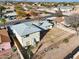 Aerial shot of a house highlighting the spacious backyard and surrounding neighborhood at 1153 E 12Th St, Casa Grande, AZ 85122