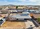 Aerial view of home, highlighting a large carport and neighboring community amenities at 1153 E 12Th St, Casa Grande, AZ 85122