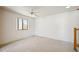 Bright bedroom with comfortable carpet flooring and a large window for natural light at 1153 E 12Th St, Casa Grande, AZ 85122