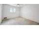 Bedroom with a window and a ceiling fan at 1153 E 12Th St, Casa Grande, AZ 85122