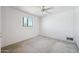 Bedroom with natural light and a ceiling fan at 1153 E 12Th St, Casa Grande, AZ 85122