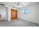 Bedroom with a closet and a ceiling fan at 1153 E 12Th St, Casa Grande, AZ 85122