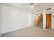 Bright living room with a staircase and comfortable carpet flooring at 1153 E 12Th St, Casa Grande, AZ 85122