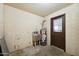 A utility room featuring a water heater and a sink at 1153 E 12Th St, Casa Grande, AZ 85122