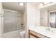 Bathroom with neutral tones, shower-tub combination, and a single sink at 12826 S 40Th Pl, Phoenix, AZ 85044