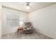 Bedroom featuring neutral tones, carpeted floor, and window at 12826 S 40Th Pl, Phoenix, AZ 85044