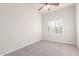 Cozy bedroom with neutral tones, plantation shutters, and soft carpet for a comfortable living space at 13007 W Tuckey Ct, Glendale, AZ 85307