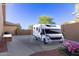 Spacious driveway with RV parking and access to the backyard at 13007 W Tuckey Ct, Glendale, AZ 85307