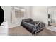 Cozy bedroom with neutral colors, carpet flooring and a window providing natural light at 13308 W Acapulco Ln, Surprise, AZ 85379