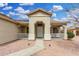 Charming single-story home with a covered porch and desert landscaping for easy upkeep at 13308 W Acapulco Ln, Surprise, AZ 85379