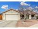 Charming single-story home featuring a two-car garage and desert landscaping for low maintenance at 13308 W Acapulco Ln, Surprise, AZ 85379