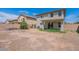 A large backyard featuring minimal landscaping and a privacy fence at 1361 W Roosevelt Ave, Coolidge, AZ 85128