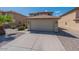 Inviting two-story home boasting a well-maintained lawn and attached two-car garage at 1361 W Roosevelt Ave, Coolidge, AZ 85128