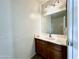 Bathroom featuring standard vanity with a mirror and a single sink at 1492 S 218Th Ln, Buckeye, AZ 85326