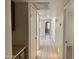 Hallway featuring tile floors, neutral walls, and recessed lighting at 1512 N Iowa St, Chandler, AZ 85225